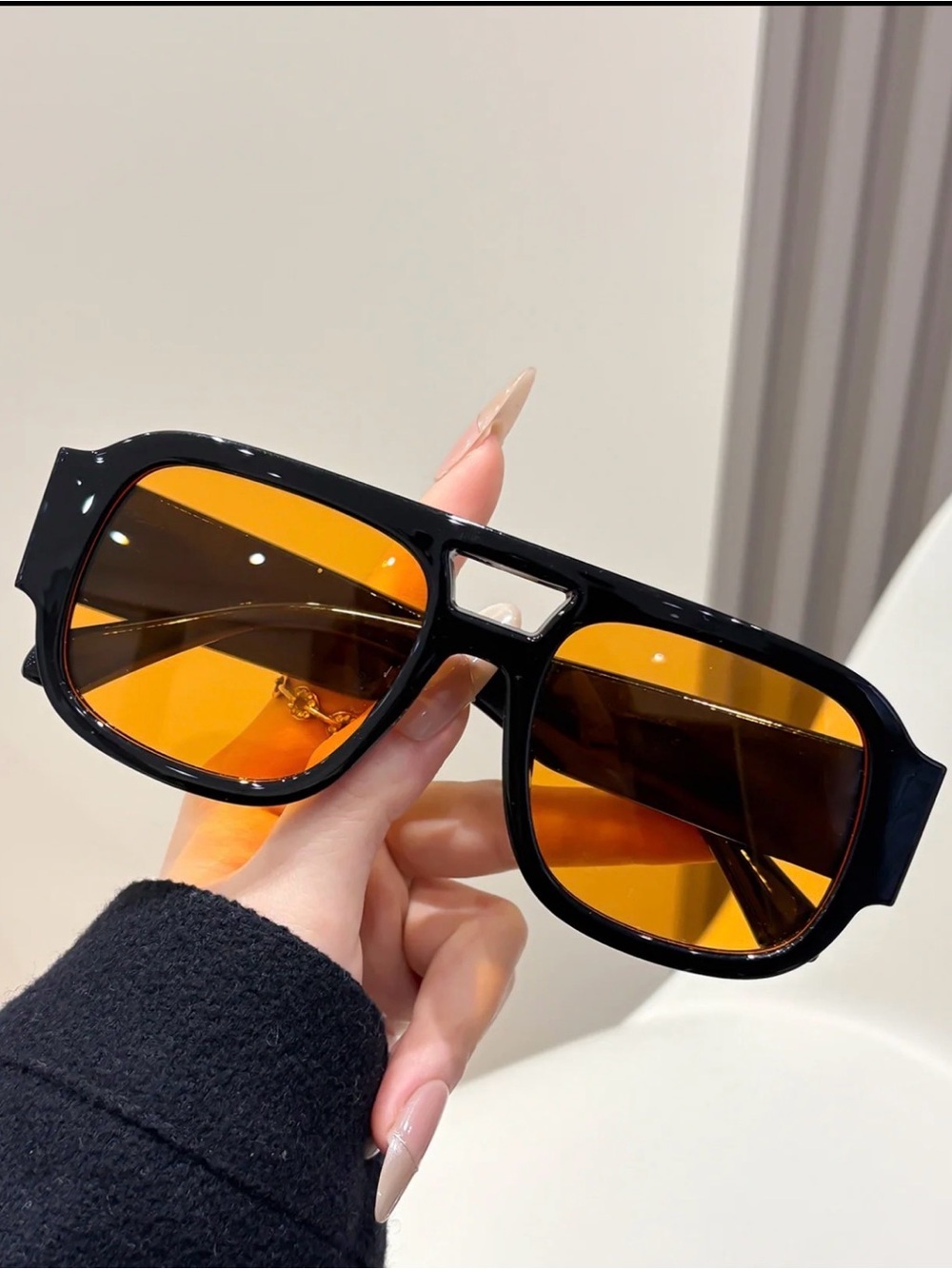 Black Frame Sunglasses with Amber Lenses